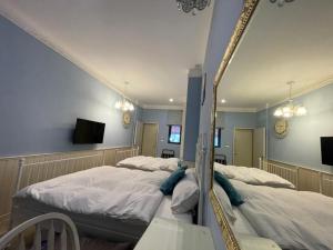 Phòng Tiêu Chuẩn 4 Người (Standard Quadruple Room)