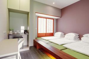 Phòng 3 Người Có Phòng Tắm Riêng (Triple Room with Private Bathroom)