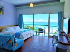 Phòng Có Giường Cỡ Queen Nhìn Ra Biển (Queen Room with Sea View)