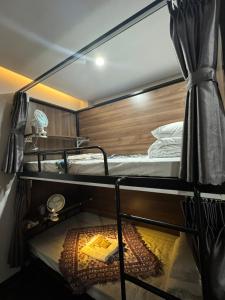 Giường trong phòng ngủ tập thể dành cho nam (Bed in Male Dormitory Room)