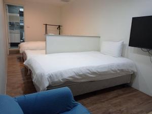 Phòng Cơ bản cho 3 người với phòng tắm dùng chung (Basic Triple Room with Shared Bathroom)