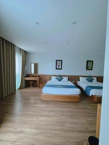 Phòng Hai Giường Đơn Loại Sang (Deluxe Twin Room)