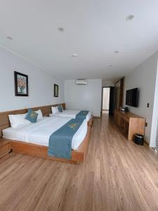 Phòng Hai Giường Đơn Loại Sang (Deluxe Twin Room)