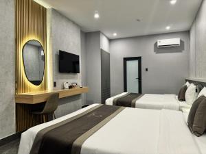 Phòng Cơ bản cho 3 người với phòng tắm dùng chung (Basic Triple Room with Shared Bathroom)