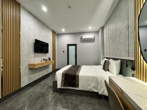 Phòng Tiêu Chuẩn Giường Đôi Lớn (Standard Queen Room)