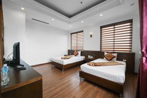 Phòng Hai Giường Đơn Loại Sang (Deluxe Twin Room)