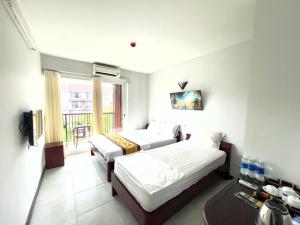 Phòng cho 3 người có Ban Công (Triple Room with Balcony)