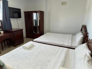 Phòng Tiêu Chuẩn Giường Đôi Lớn (Standard Queen Room)