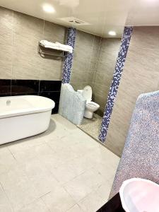 Phòng 4 Người Có Bồn Tắm (Quadruple Room with Bath)