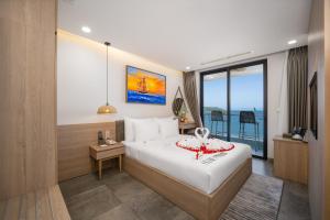 Phòng Deluxe Giường Đôi Với Ban Công và Tầm Nhìn Ra Biển (Deluxe Double Room with Balcony and Ocean View)