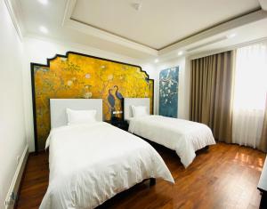 Phòng Hai Giường Đơn Loại Sang (Deluxe Twin Room)