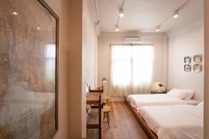 Phòng Hai Giường Đơn Loại Sang (Deluxe Twin Room)