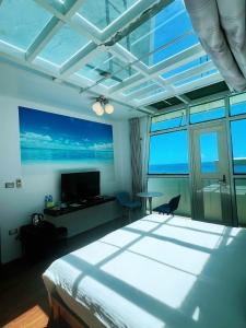Phòng Deluxe Giường Đôi Với Ban Công và Tầm Nhìn Ra Biển (Deluxe Double Room with Balcony and Sea View)