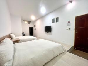 Phòng gia đình với phòng tắm riêng. (Family Room with Private Bathroom)