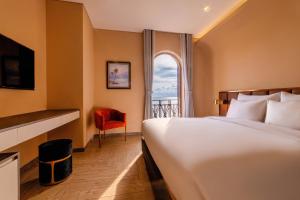 Phòng Có Giường Cỡ Queen Nhìn Ra Biển (Queen Room with Sea View)