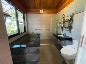 Phòng Có Giường Cỡ Queen Nhìn Ra Vườn (Queen Room with Garden View)