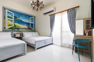 Phòng 3 người có ban công (Triple Room with Balcony)