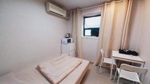 Phòng Giường Đôi Có Phòng Tắm Riêng (Double Room with Private Bathroom)
