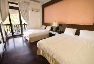 Phòng 4 người nhìn ra vườn (Quadruple Room with Garden View)