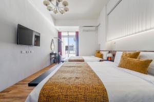 Phòng 4 người có ban công (Quadruple Room with Balcony)