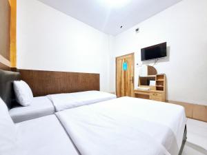 Phòng Hai Giường Đơn Loại Sang (Deluxe Twin Room)