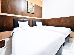 Phòng Hai Giường Đơn Loại Sang (Deluxe Twin Room)