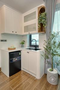 One-Bedroom Apartment with Balcony and Water View