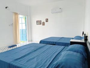 Phòng Bốn Người Có Phòng Tắm Riêng (Quadruple Room with Private Bathroom)