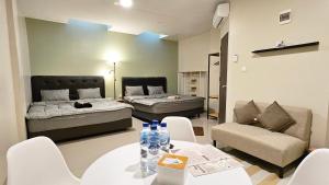 Phòng Giường Đôi Lớn Loại Sang (Deluxe Queen Room)