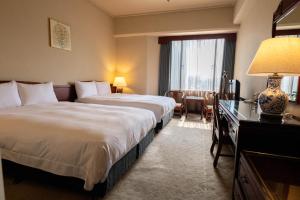 Phòng tiết kiệm 4 người (Economy Quadruple Room)