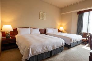 Phòng tiết kiệm 4 người (Economy Quadruple Room)