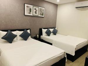 Phòng Superior Đôi có 2 Giường Đôi (Superior Double Room with Two Double Beds)