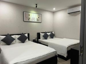 Phòng Superior Đôi có 2 Giường Đôi (Superior Double Room with Two Double Beds)