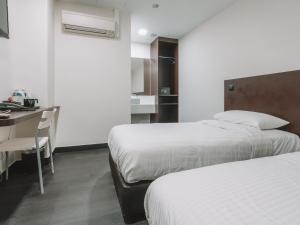 Phòng Superior 2 Giường đơn - Không có Cửa sổ (Superior Twin - No Window)