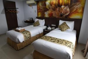 Phòng Hai Giường Đơn Loại Sang (Deluxe Twin Room)
