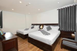 Phòng Hai Giường Đơn Loại Sang (Deluxe Twin Room)