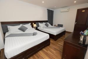 Phòng Hai Giường Đơn Loại Sang (Deluxe Twin Room)
