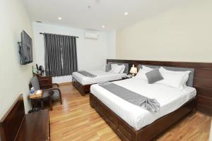 Phòng Deluxe Đôi Với 2 Giường Đôi (Deluxe Double Room with Two Double Beds)