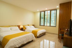 Phòng Deluxe Family Nhìn ra Núi (Deluxe Family Room with Mountain View)