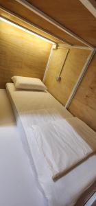 Giường trong Phòng ngủ tập thể cả Nam và Nữ 4 Người (Bed in 4-Bed Mixed Dormitory Room)