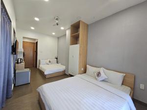 Phòng Hạng Tiết kiệm Cho 4 Người (Economy Quadruple Room)