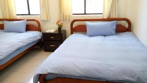 Phòng 2 Giường Đơn Với Phòng Tắm Riêng (Twin Room with Private Bathroom)