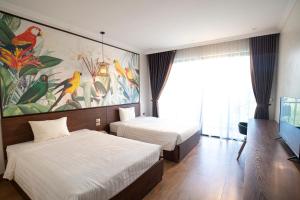 Phòng 2 Giường Đơn Nhìn Ra Khu Vườn (Twin Room with Garden View)