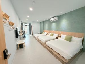 Suite Gia Đình Có Ban Công (Family Suite with Balcony)