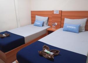 Phòng Hai Giường Đơn Loại Sang (Deluxe Twin Room)