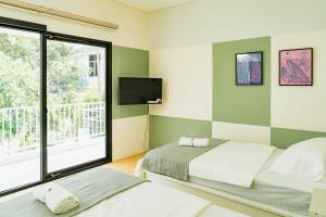 Phòng Giường Đôi Nhìn Ra Vườn (Double Room with Garden View)