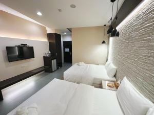 Phòng Tiêu Chuẩn 4 Người (Standard Quadruple Room)