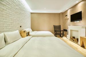 Phòng dành cho 4 Khách không có Cửa sổ (Quadruple Room without Window)