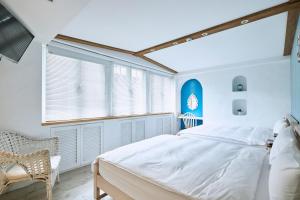 Phòng Deluxe cho 4 Người với Cửa sổ (Deluxe Quadruple Room with Window)