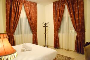 Three-Bedroom Apartment room in Sara Hotel Apartments - BAITHANS GROUP